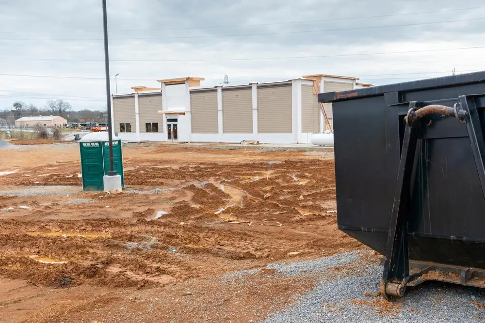 Portable toilet at a commercial building construction site