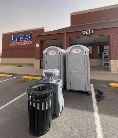 Temporary portable toilets and handwash station outside a store